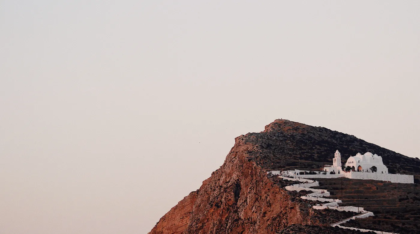 The church of Panagia above Chora on Folegandros, its zigzag path cut into the cliff