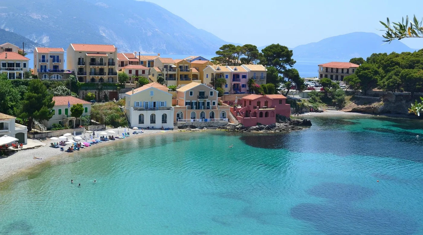 The pastel houses of Assos on Kefalonia between two bays