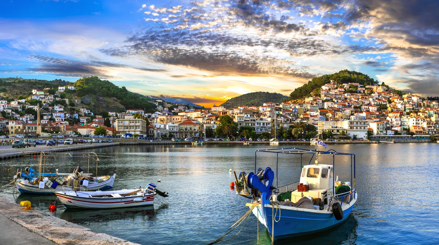 Fishing boats at dusk in a harbour town of the North Aegean
