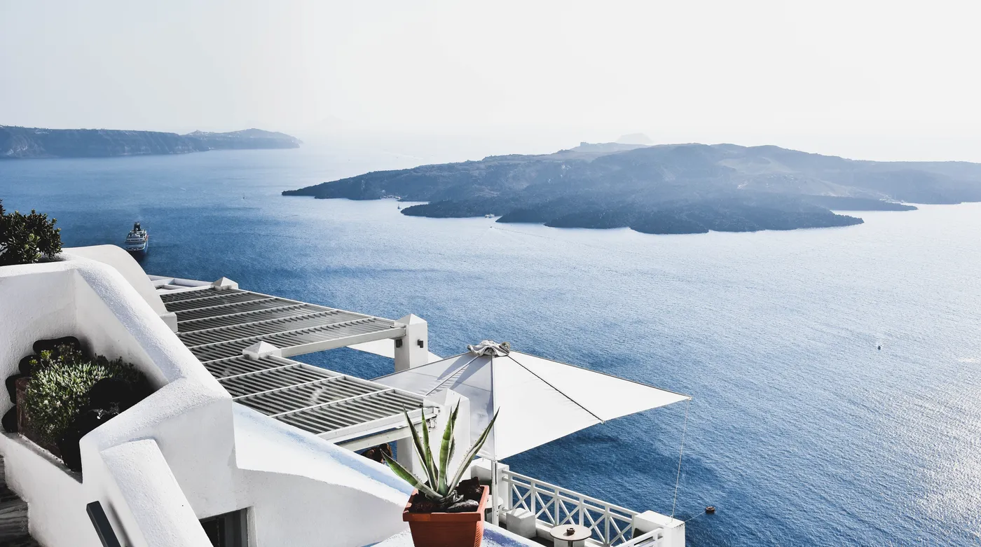 The caldera of Santorini from a terrace above Fira, the burnt islands across the water