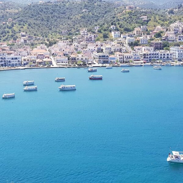 11Narrow alleys with whitewashed stairways with hidden treasures around every corner. Colorful flowers and stray cats. Turquoise seas. Yachts. Just perfect.